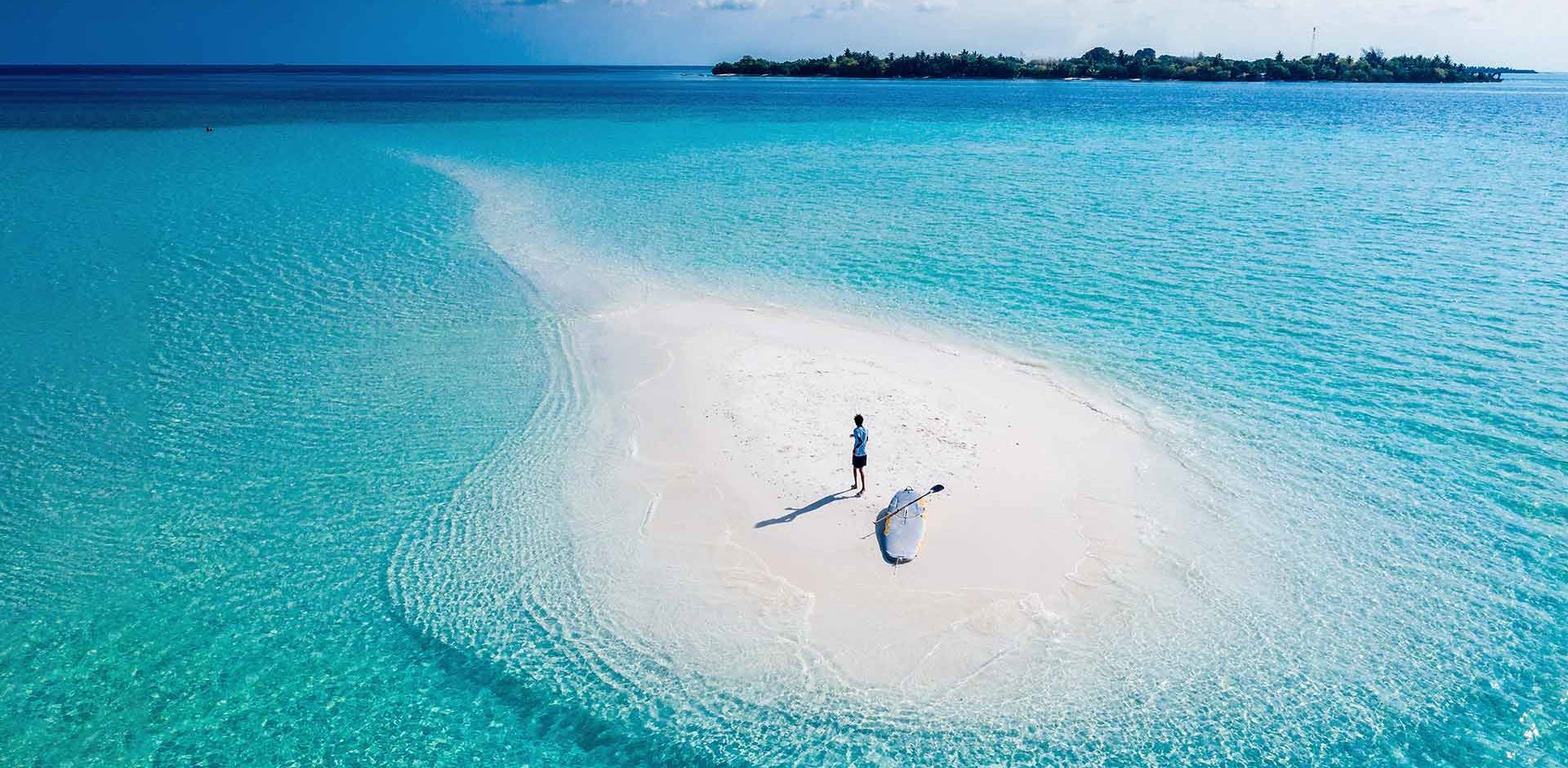 Maldiverne Sandstrand Person med board 