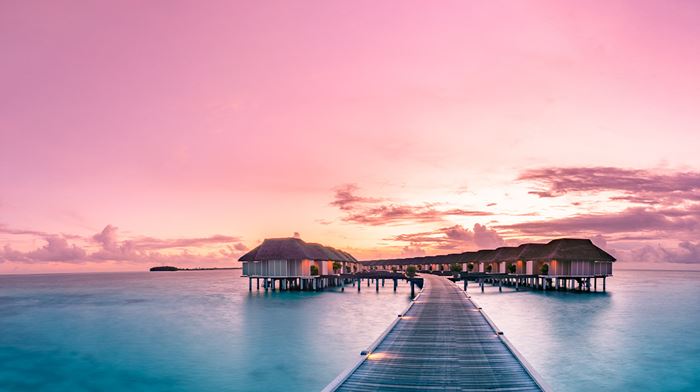 Maldiverne Huse i vandet Aftenhimmel 
