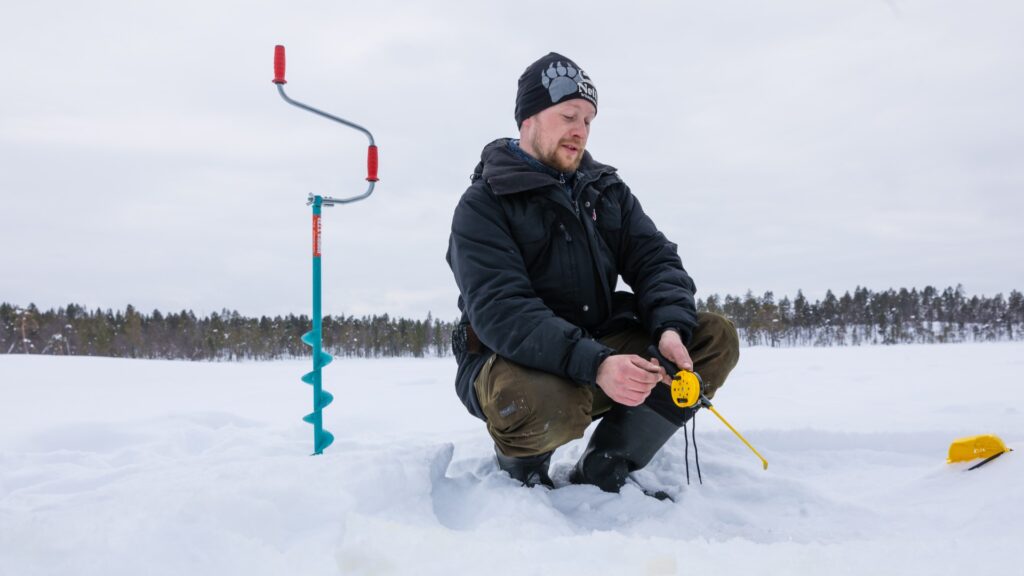 Finland Finske Lapland Nellim Wilderness Hotel, Icefishing, Vinterfiskeri, Vinter, Sne
